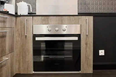 Cuisine ou kitchenette dans l'établissement La Suite Urbaine - Place d'Erlon - Bulle de Calme
