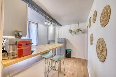 Cuisine ou kitchenette dans l'établissement The Timothée