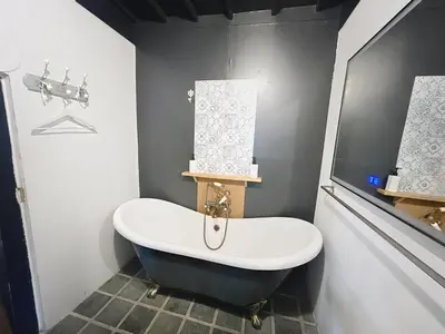Salle de bains dans l'établissement Le Napoléon