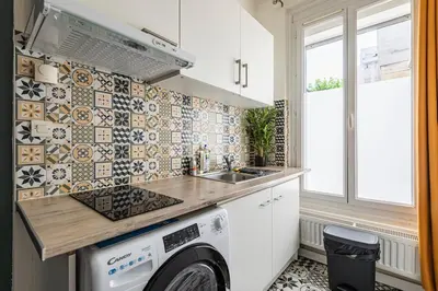 Cuisine ou kitchenette dans l'établissement Pentagone 4 Reims