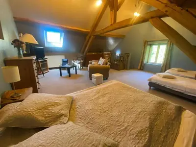 Un ou plusieurs lits dans un hébergement de l'établissement Maison au jardin à Bannost-Villegagnon