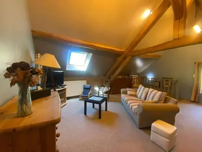 Coin salon dans l'établissement Maison au jardin à Bannost-Villegagnon