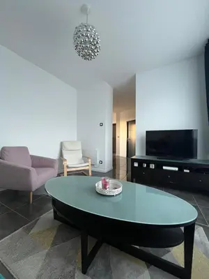 Télévision ou salle de divertissement dans l'établissement Champagne