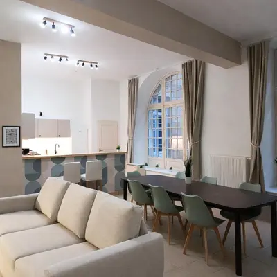 Coin salon dans l'établissement Superbe appartement rénové face au fort de Sedan