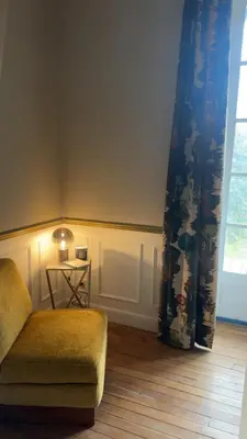 Coin salon dans l'établissement Chambre dans demeure de caractère