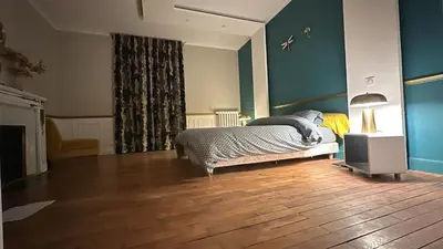 Un ou plusieurs lits dans un hébergement de l'établissement Chambre dans demeure de caractère