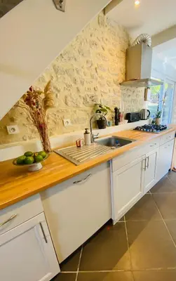 Cuisine ou kitchenette dans l'établissement Maison en pleine nature