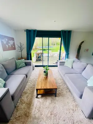 Coin salon dans l'établissement Maison en pleine nature