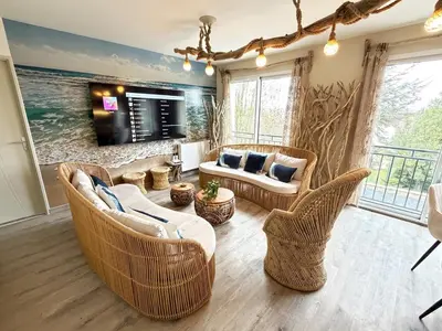 Coin salon dans l'établissement Villa avec Spa & Cinéma à 35 min d'Asterix