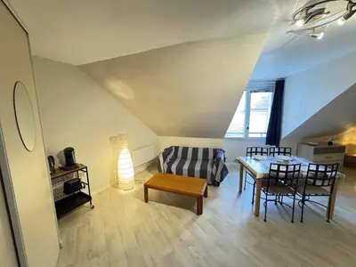 Coin salon dans l'établissement Appartement centre Compiègne