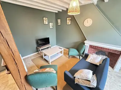 Télévision ou salle de divertissement dans l'établissement Maison nature rénovée