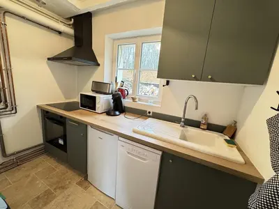 Cuisine ou kitchenette dans l'établissement Maison nature rénovée