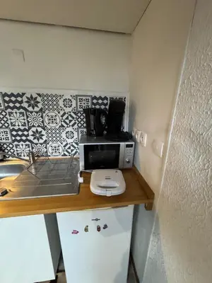 Cuisine ou kitchenette dans l'établissement Les 4 Piliers