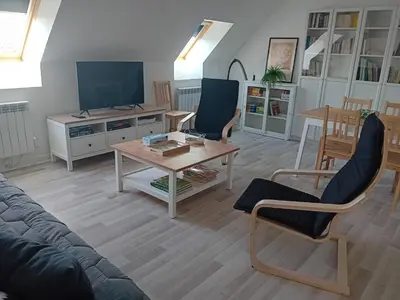 Télévision ou salle de divertissement dans l'établissement Appartement dans petite ville près de Reims