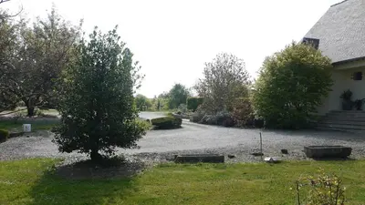 Jardin de l'établissement GITE DE MAMIE - jusqu'à 20 personnes