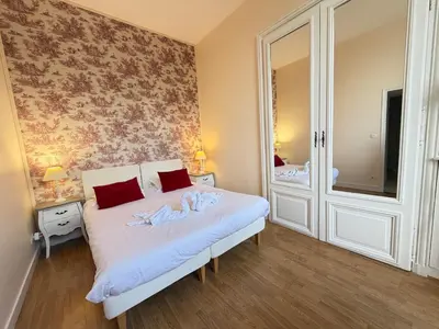 Un ou plusieurs lits dans un hébergement de l'établissement Studio au château