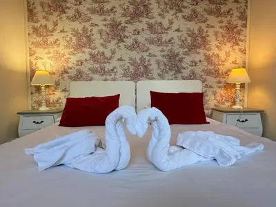 Un ou plusieurs lits dans un hébergement de l'établissement Studio au château