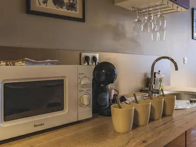 Cuisine ou kitchenette dans l'établissement Appartement central calme à Reims - FR-1-870-8