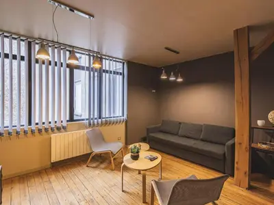 Coin salon dans l'établissement Appartement central calme à Reims - FR-1-870-8