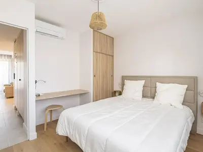 Un ou plusieurs lits dans un hébergement de l'établissement Élégant Appartement Moderne à Reims avec Climatisation - FR-1-870-13