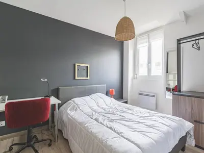 Un ou plusieurs lits dans un hébergement de l'établissement Somptueux Appartement au cœur de Reims - FR-1-870-5