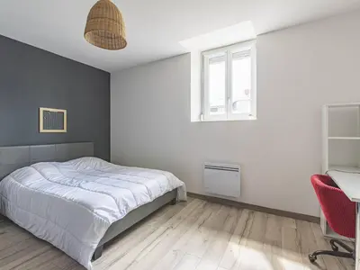 Un ou plusieurs lits dans un hébergement de l'établissement Somptueux Appartement au cœur de Reims - FR-1-870-5