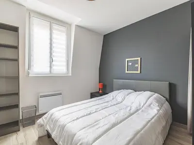 Un ou plusieurs lits dans un hébergement de l'établissement Somptueux Appartement au cœur de Reims - FR-1-870-5