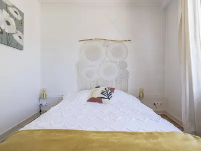 Un ou plusieurs lits dans un hébergement de l'établissement Duplex Élégant au Cœur de Reims - 2 Chambres - FR-1-870-15