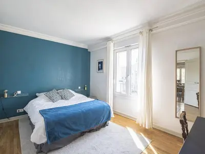 Un ou plusieurs lits dans un hébergement de l'établissement Duplex Élégant au Cœur de Reims - 2 Chambres - FR-1-870-15