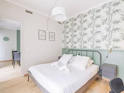 Un ou plusieurs lits dans un hébergement de l'établissement Appartement Chic à Reims, Wi-Fi Gratuit - FR-1-870-22