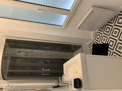 Cuisine ou kitchenette dans l'établissement Location Conviviale à Reims avec Parking et Terrasse privée - FR-1-870-19