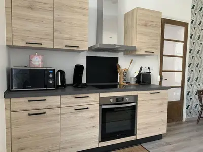 Cuisine ou kitchenette dans l'établissement Location Conviviale à Reims avec Parking et Terrasse privée - FR-1-870-19
