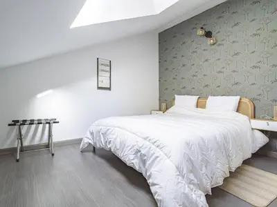 Un ou plusieurs lits dans un hébergement de l'établissement Appartement Chic à Reims, Confort & Élégance - FR-1-870-28
