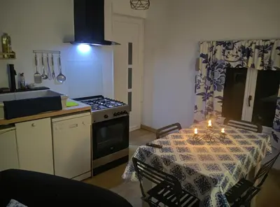 Cuisine ou kitchenette dans l'établissement Mise au vert
