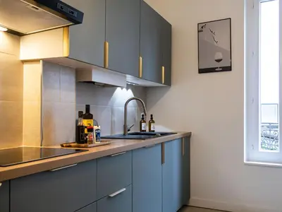Cuisine ou kitchenette dans l'établissement Appartement de charme en hyper centre