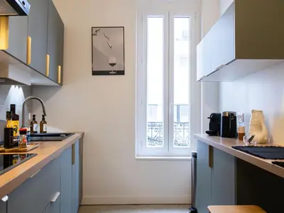 Cuisine ou kitchenette dans l'établissement Appartement de charme en hyper centre
