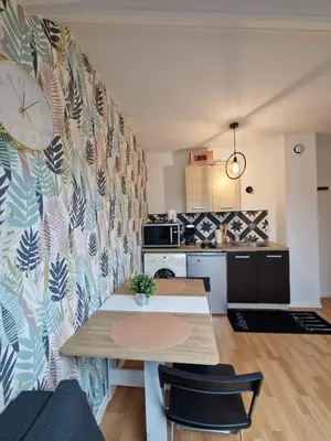 Cuisine ou kitchenette dans l'établissement Le Ptit Bocquaine - Central - arrêt Comédie