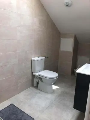 Salle de bains dans l'établissement Deux appartements proche Disneyland