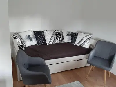 Coin salon dans l'établissement Studio confortable à Barzy-en-Thiérache, 32 m² avec terrasse
