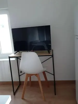Télévision ou salle de divertissement dans l'établissement Studio confortable à Barzy-en-Thiérache, 32 m² avec terrasse