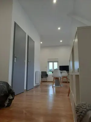 Coin salon dans l'établissement Studio confortable à Barzy-en-Thiérache, 32 m² avec terrasse