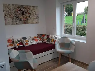 Coin salon dans l'établissement Studio 4 personnes à Barzy-en-Thiérache
