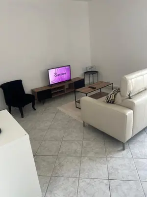 Télévision ou salle de divertissement dans l'établissement Appartement calme et cosy tout équipé