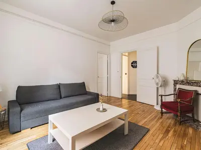 Coin salon dans l'établissement Appartement Central à Reims - Près de la Cathédrale - FR-1-870-11
