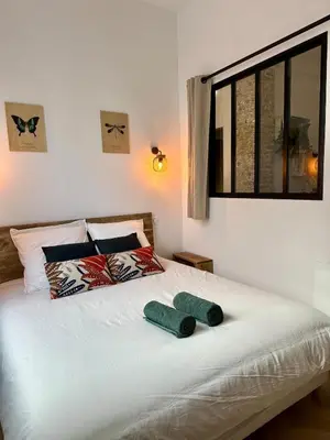 Un ou plusieurs lits dans un hébergement de l'établissement Appartement cozy & Spa