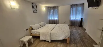 Un ou plusieurs lits dans un hébergement de l'établissement Belle maison au centre d AY, 7 minutes en voiture de l Avenue de Champagne Epernay