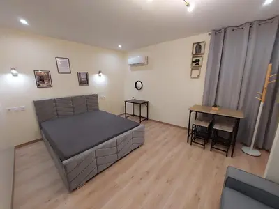 Un ou plusieurs lits dans un hébergement de l'établissement Bel studio rénové au cœur de la ville RDC pratique Ground Floor