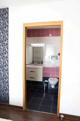 Salle de bains dans l'établissement L'escale Aux Framboises