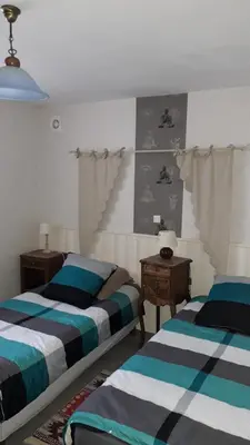 Un ou plusieurs lits dans un hébergement de l'établissement Villa Jules Verne - Chambres d'hôtes et gîte