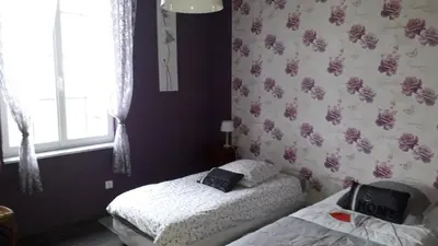 Un ou plusieurs lits dans un hébergement de l'établissement Villa Jules Verne - Chambres d'hôtes et gîte
